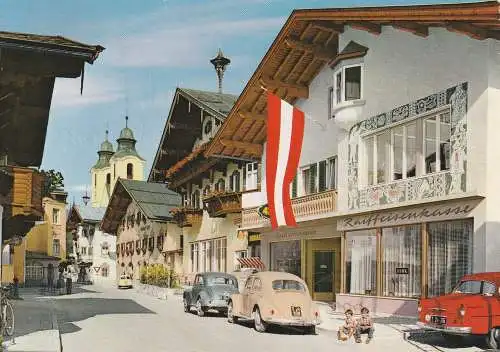 [Ansichtskarte] A 6380 ST. JOHANN / Tirol, Speckbacherstrasse, Raiffeisenkasse, VW - Käfer, BMW - ISETTA, 1963. 