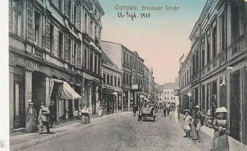 [Ansichtskarte] POSEN - OSTROWO / OSTROW WIELKOPOLSKIE, Breslauer Strasse, Ladengeschäfte belebte Szene, 1915, Feldpost. 