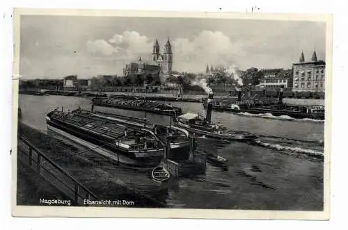 [Ansichtskarte] BINNENSCHIFFE - ELBE, Frachtschiffe und Schlepper vor Magdeburg, 1932. 