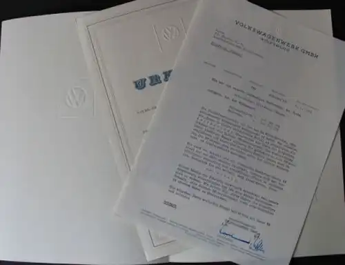 Volkswagen 100.000 KM Urkunde mit VW-Anschreiben und Mappe 1957