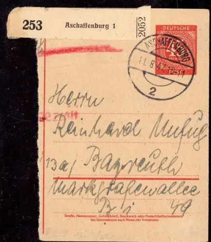 E 1569 Ganzsache Stammteil einer Notpaketkarte aus Aschaffenburg mit Freistempel