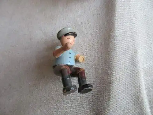 Traktor mit Anhänger Holz mit Figur 