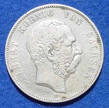 (1038931) Silbermünze Sachsen 5 Reichsmark 1876 Deutsches Reich. Jaeger Nr. 122. Siehe bitte Bilder.

