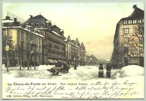 () Ansichtskarte aus der Schweiz. " La Chaux-de-Fonds en hiver - Rue Leopold Robert". Beschrieben u. postalisch gelaufen mit Marke u. Stempel v. 1906