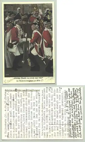 (-50676-011) Ansichtskarte. Farbige Festpostkarte 'Kölsche Funke rut-wieß vun 1823' im Rosenmontagszug zu Köln.  Reihe: 'Gestalten und Bilder vom Kölner Karneval'. Rückseite beschrieben u. datiert 1938. Verlag Hoursch + Bechstedt, Köln. 