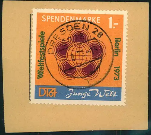 1973 1,- Mark Spendenmarke glasklar zentrisch gestempelt auf Briefstück.