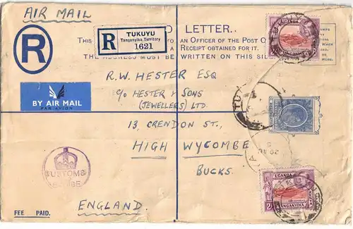 1950, registered stationery envelope (20 x 12,4 cm) with additional franking to England