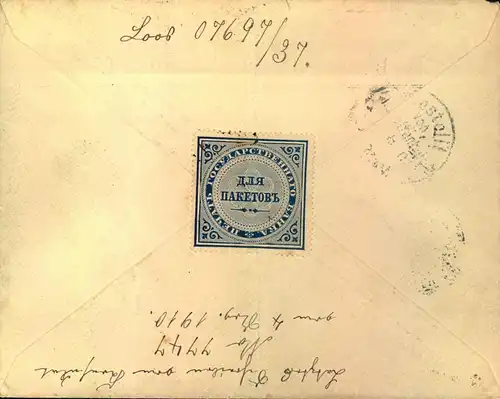 1902, letter franked with 20 Kop. Coat of arms from ST. PETERSBURG to Berlin. Interesting parcel stamp on back.