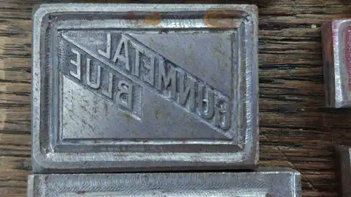 C58/ Acht Druckmatritzen Matrize Werbung aus Metall