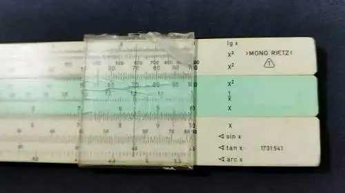 G515a/ Rechenschieber Rechenstab VEB Mantissa “mono Rietz” DDR leicht beschädigt