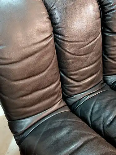 De Sede DS-600 Leather Sofa. Swiss, 1970. De Sede DS-600 leather sofa with 15 elements in brown / black leather. Designer: Ueli Berger, Elenora Peduzzi-Riva, Heinz Ulrich,Klaus Vogt. Height: 29,5 in, Depth: 39,4 in, Width/Length: 169,3 in.