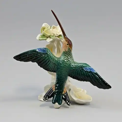 9959548 Porzellan Figur Kolibri fliegend mit Blüte gelb/weiß  Vogel Ens H18cm