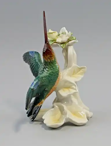 9959548 Porzellan Figur Kolibri fliegend mit Blüte gelb/weiß  Vogel Ens H18cm