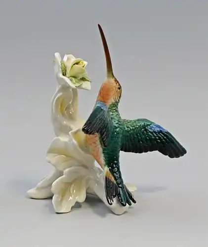 9959548 Porzellan Figur Kolibri fliegend mit Blüte gelb/weiß  Vogel Ens H18cm