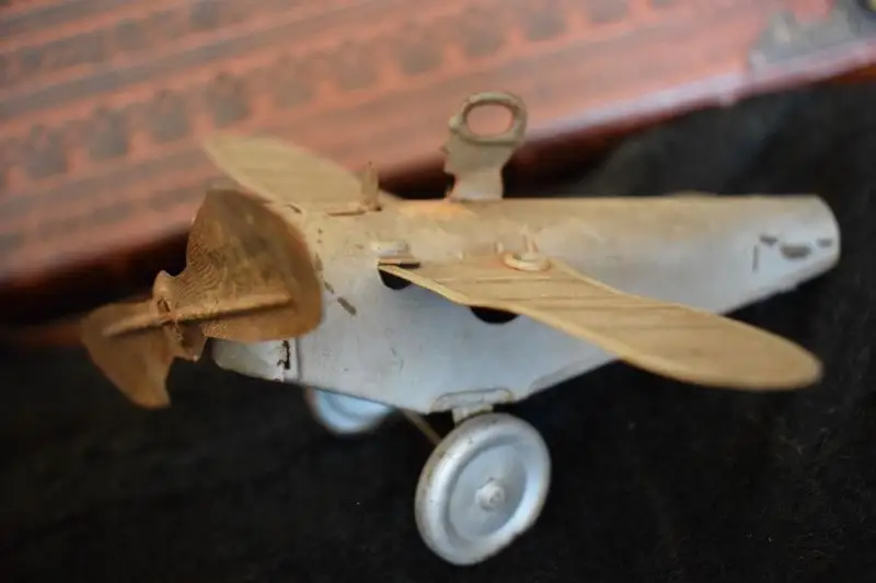 Altes Blechspielzeug, Flugzeug, Propeller DRGM USA Pat. appl. For 1