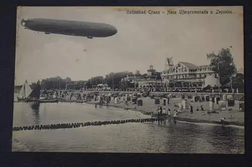 Ak Ostseebad Cranz, Neue Uferpromenade u. Zeppelin, 1916 gelaufen