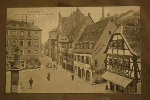 Ak Würzburg Dreikronenplatz mit Burkaderstraße, J.G. Binder Colonialwarenladen