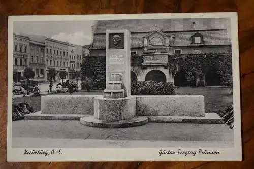 Ak Kreuzburg O.-S., Gustav Freytag Brunnen, um 1939 gelaufen