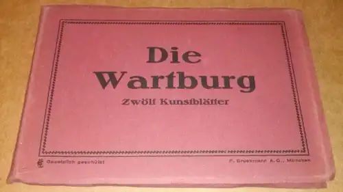 F. Bruckmann A. G. München (Hrsg.): Die Wartburg. Zwölf Kunstblätter [Postkarten - Ansichtskarten, jeweils Querformate] - Leporello-Album mit OPbd.-Umschlag / Aufnahmen nebeneinander, unten am Rand...