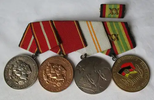 DDR Ordensspange NVA mit 4 Orden einer aus 900er Silber (129109)