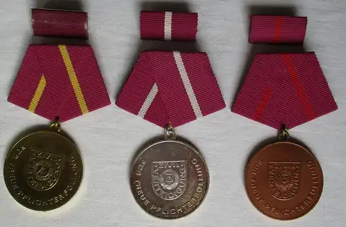 DDR Medaille Treue Pflichterfüllung Zivilverteidigung + Etui Bronze-Gold /118579