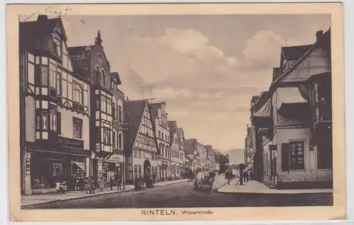 902956 Ak Rinteln Weserstrasse mit Geschäften 1911