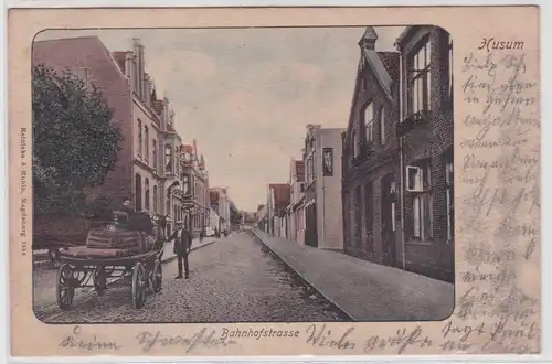 901745 Ak Husum Bahnhofstrasse mit Pferdefuhrwerk 1904