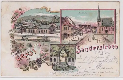 902564 Ak Lithographie Gruß aus Sandersleben Bahnhof, Denkmal usw. 1902