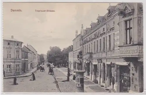 32354 Ak Demmin Treptower Strasse mit Geschäften um 1910