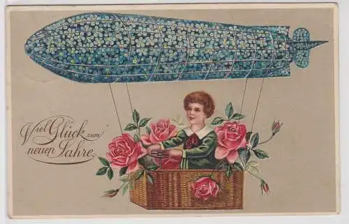 44479 Neujahrs Ak Kind steuert Zeppelin Luftschiff im Blütenschmuck 1911