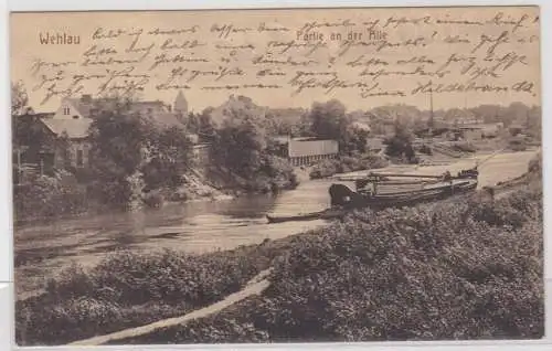 89963 AK Wehlau (Snamensk) - Partie an der Alle, Flusspartie mit Schiff 1913