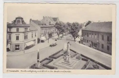 92265 Ak Elsterwerda Denkmalsplatz mit Blick in die Berlinerstraße um 1930