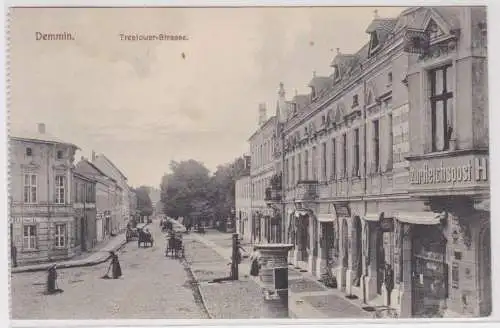 72088 Ak Demmin Treptower Strasse mit Geschäften 1911