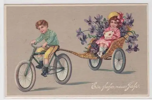 29221 Präge AK Ein frohes neues Jahr Fahrradfahrer mit Anhänger und Kind 1912