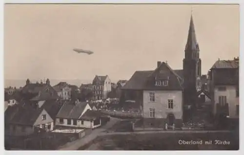 99729 AK Oberland (Helgoland) mit Kirche, Ortsansicht mit Zeppelin Luftschiff