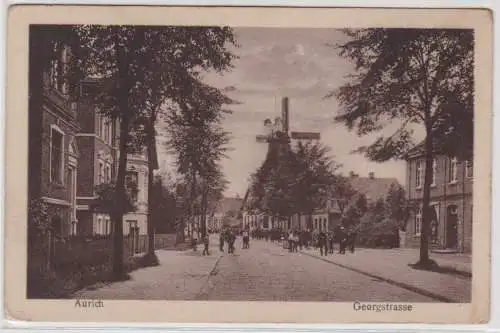 99478 AK Aurich - Georgstrasse, Straßenansicht mit Windmühle und Parade