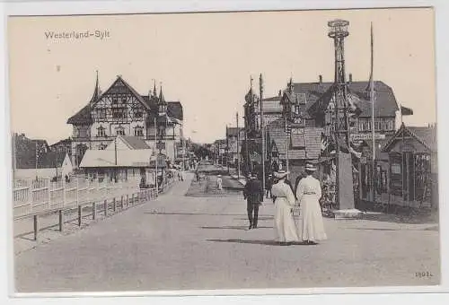 93648 Ak Westerland-Sylt - Promenade mit Geschäften um 1915