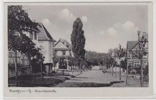 87038 AK Northeim i. H. - Raustraße, Straßenansicht um 1930