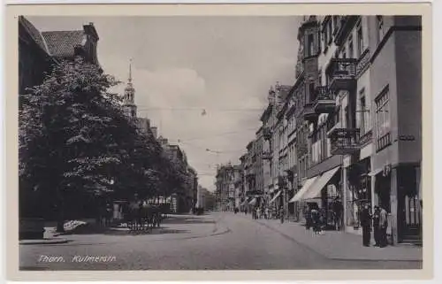 901894 Ak Thorn Torun Kulmerstrasse mit Geschäften um 1940