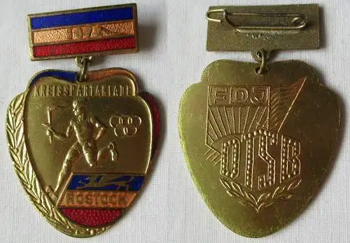 Emailliertes Abzeichen Kreisspartakiade Rostock 1972 Gold (112266)
