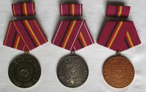 DDR Verdienstmedaille der Zivilverteidigung in Bronze - Gold im Etui (115046)