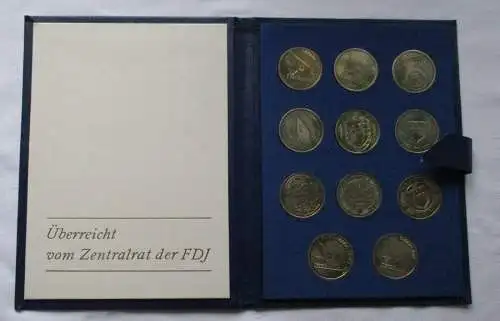 DDR Mappe mit 11 Medaillen FDJ I. - XI. Parlament 1946 - 1981 (134097)