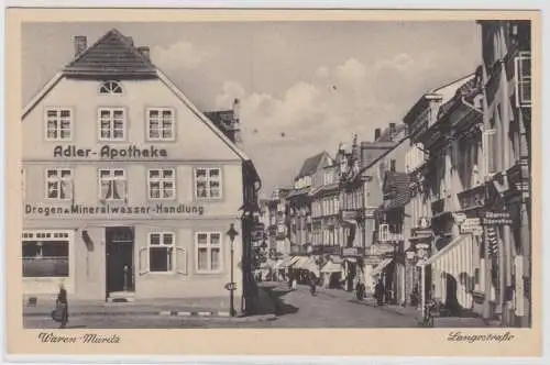97979 Ak Waren Müritz Landestraße und Adler Apotheke um 1940