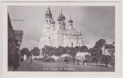 901895 Feldpost Ak Stimmungsbild am Markt in Grodno mit griech.-kath. Kirche