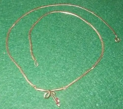 zeitlose Kette aus 333er Gold Schleife mit Schmuckstein