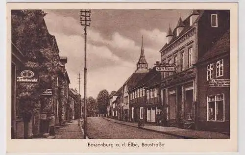 907706 Ak Boizenburg a. d. Elbe - Baustraße mit Konsum, Firma Schoknecht