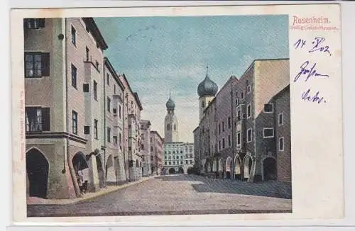 87988 AK Rosenheim - Heilig-Geiststrasse, Straßenansicht mit Kirche 1911