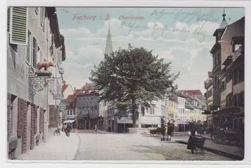 72663 AK Freiburg im Breisgau - Oberlinden Straßenansicht mit Kutschen 1915