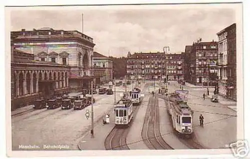 12303 Ak Mannheim Bahnhofplatz Straßenbahnen um 1930