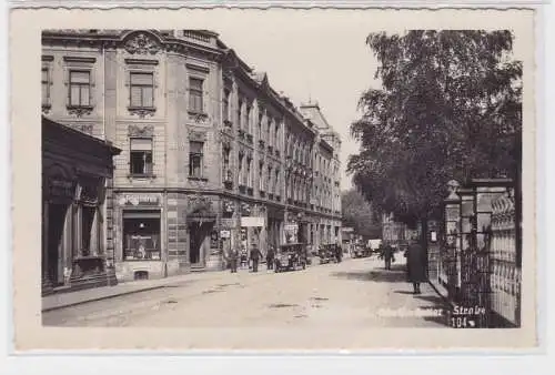 76705 Foto Ak Warnsdorf Strassenansicht mit Geschäften 1942